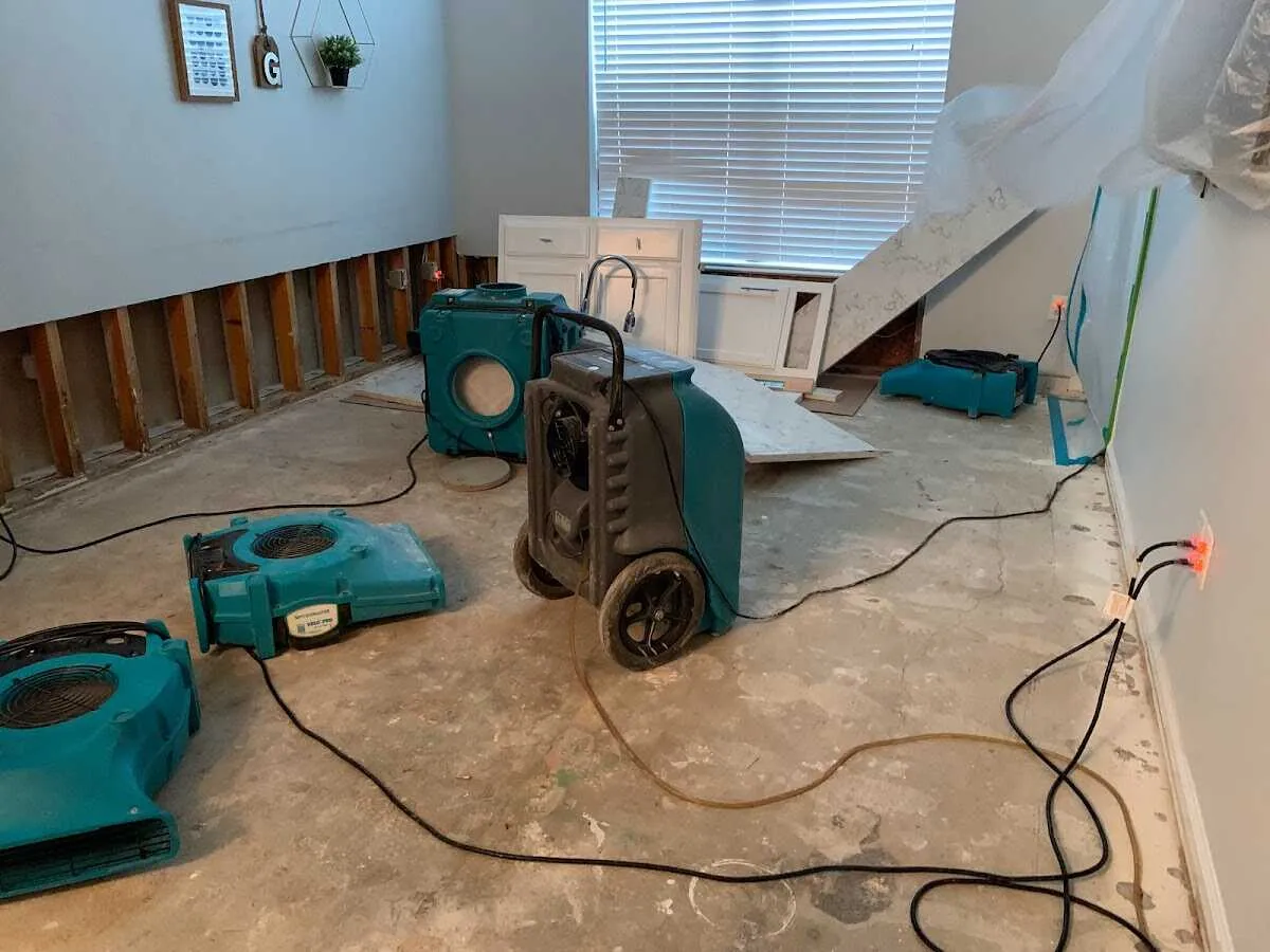 Dehumidifier in flood-cut room for Water Damage Restoration in Houston